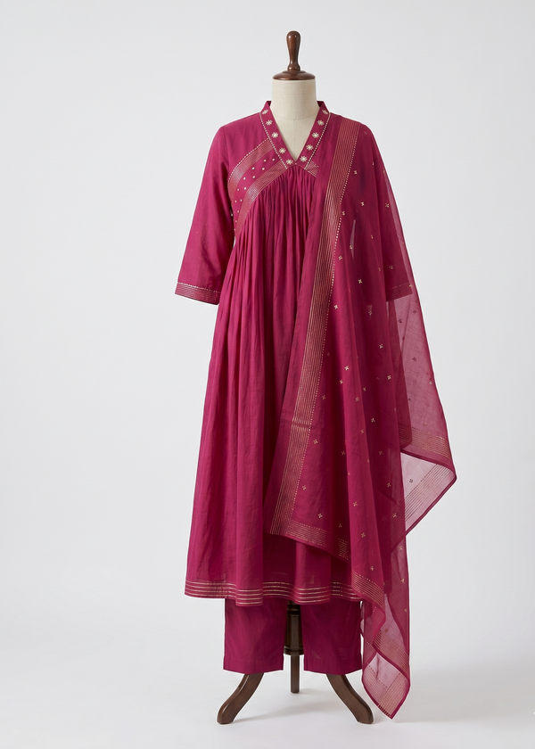 Front view of Magenta Komal Anarkali Suit Set with dupatta in a flowy ethnic silhouette